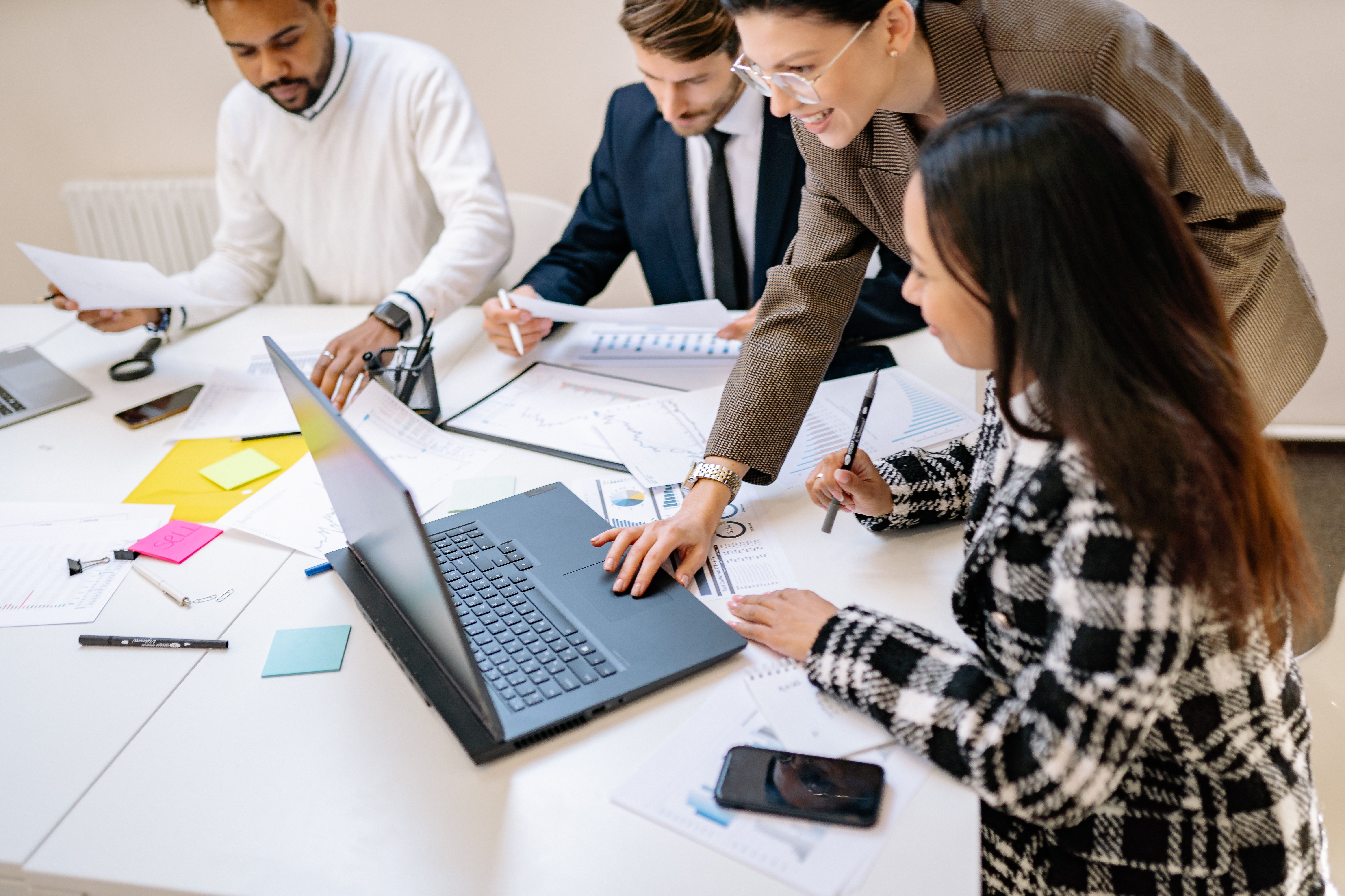 Consultant and client reviewing documents at a table